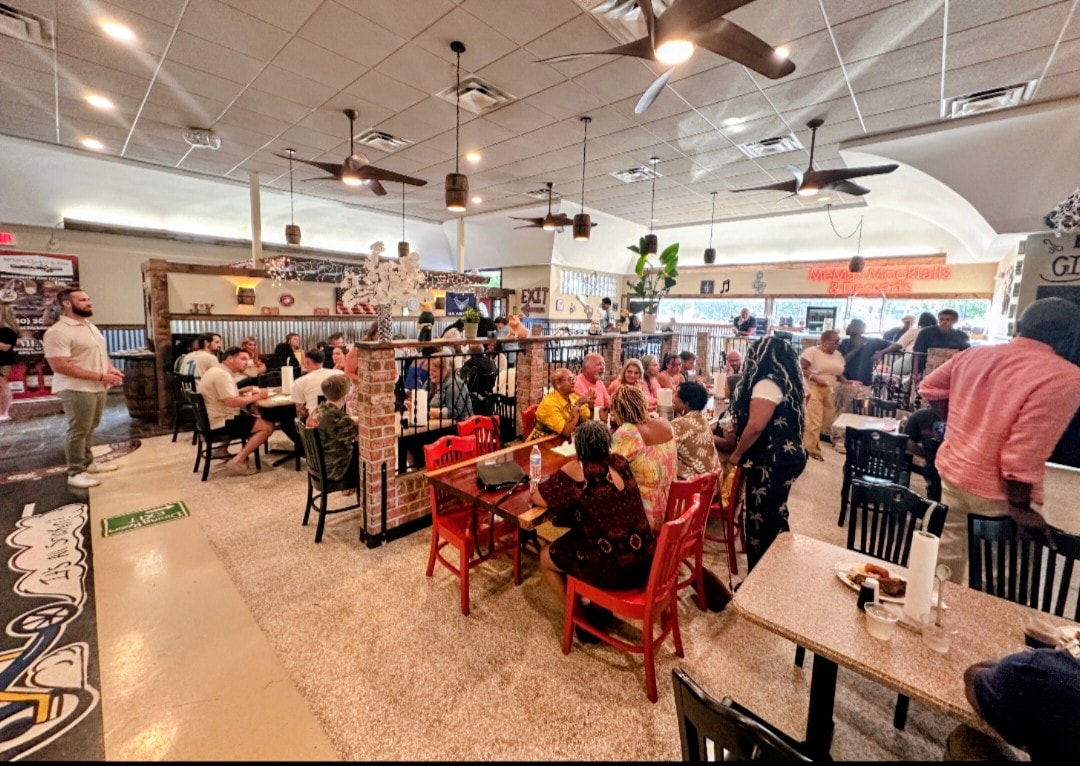 The community gathered around tables at the DEVOTED anniversary dinner