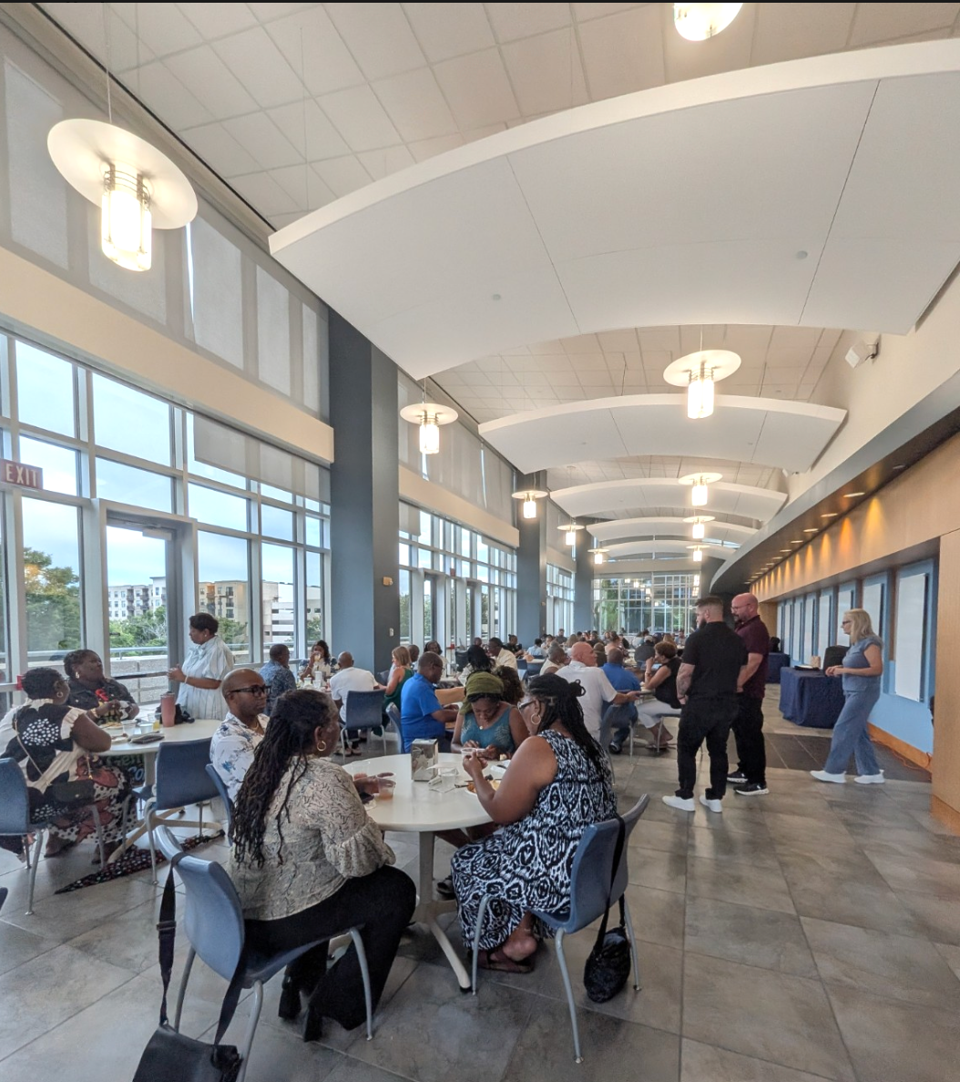 DEVOTED community gathering around shared tables